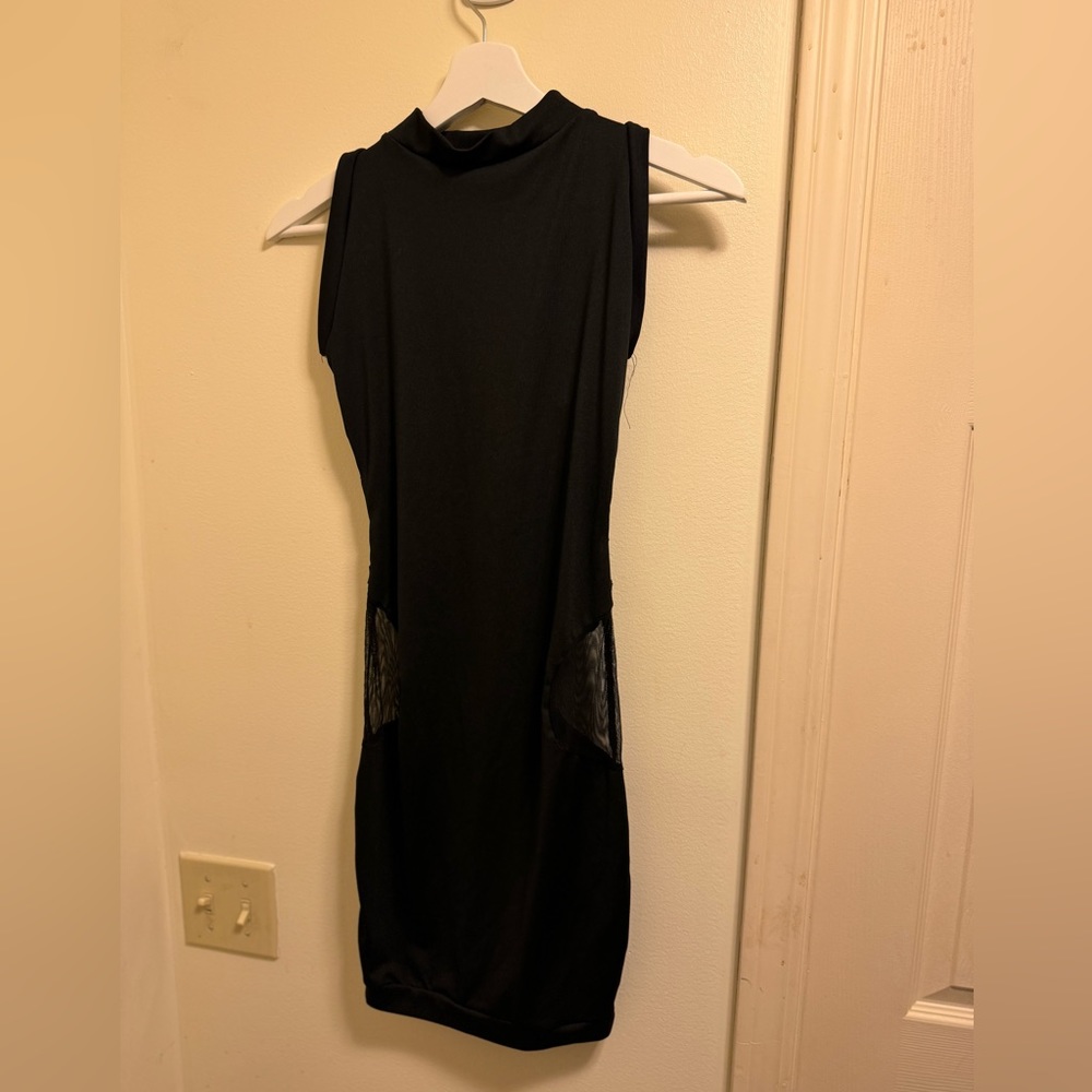 Fitted black mini with sheer panels